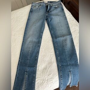 Hudson jeans that fit straight they has a slit at the bottom. Super cute!
